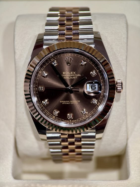 This exquisite timepiece comes new from AD. Timepiece was only sized at AD before being re boxed. Chocolate diamond dial remains one of the most sought after Datejust on the market.