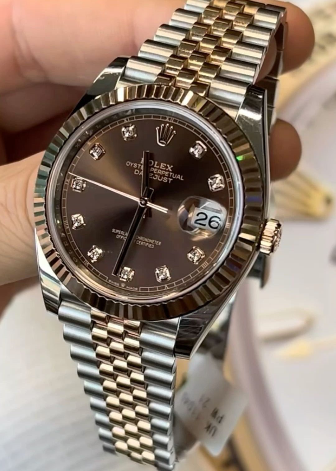 This exquisite timepiece comes new from AD. Timepiece was only sized at AD before being re boxed. Chocolate diamond dial remains one of the most sought after Datejust on the market.